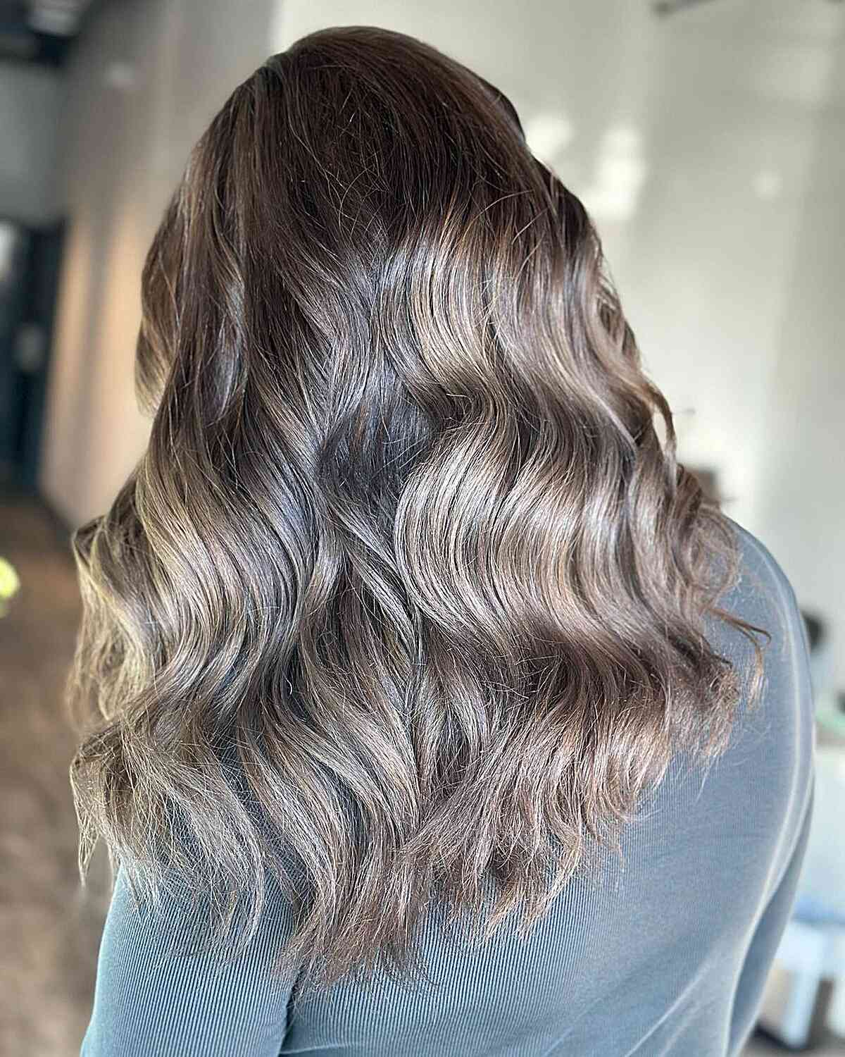 Blended Silver and Mushroom Brown Balayage Hues on Wavy Medium-Length Hair